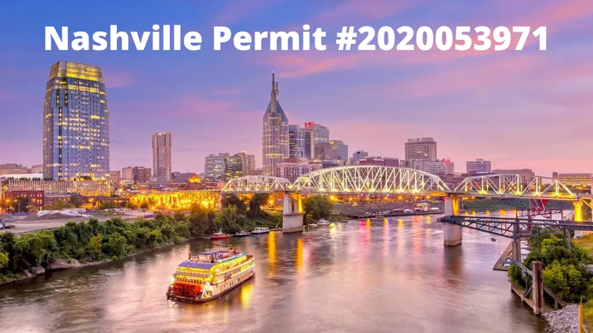 A panoramic view of the Nashville skyline, riverboat on the water, and city bridges, capturing the excitement and beauty of downtown from a broader perspective.