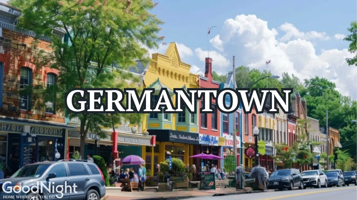 A charming, tree-lined street featuring colorful storefronts and people dining outdoors, exuding a lively yet welcoming neighborhood atmosphere. The scene suggests a vibrant local dining and shopping scene ideal for couples to explore.